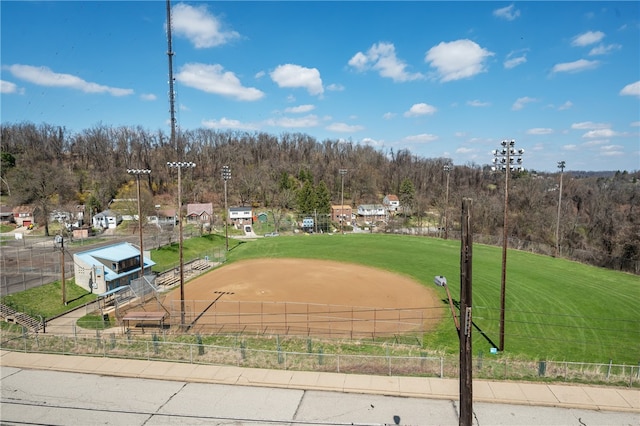 view of property's community featuring a yard