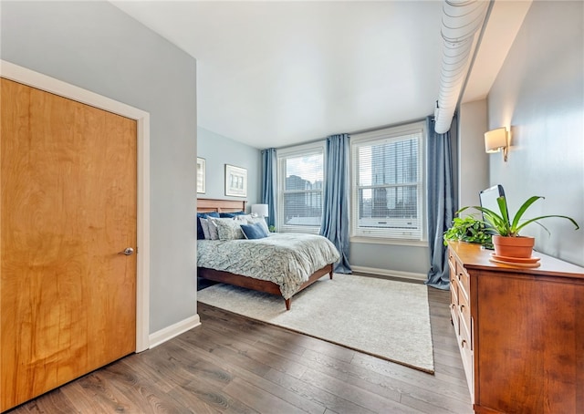 bedroom featuring hardwood / wood-style flooring