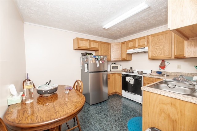 kitchen featuring light brown cabinets, dark tile floors, sink, white appliances, and a textured ceiling