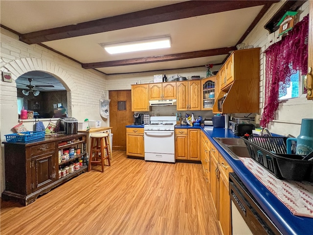 kitchen featuring ceiling fan, light hardwood / wood-style floors, white appliances, beamed ceiling, and brick wall