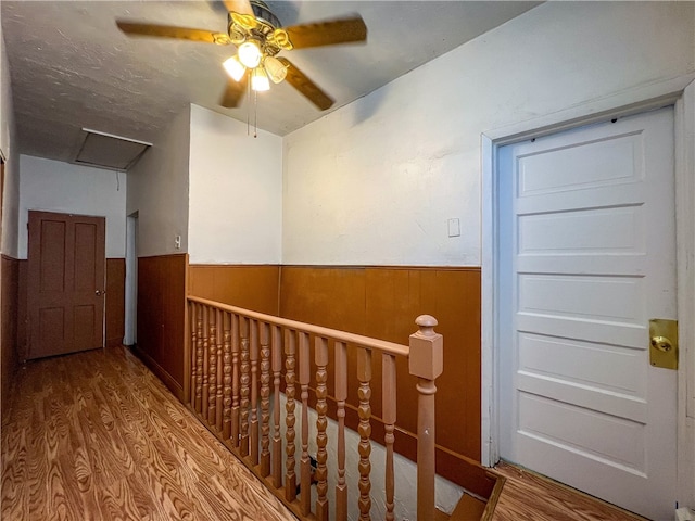 corridor featuring hardwood / wood-style flooring