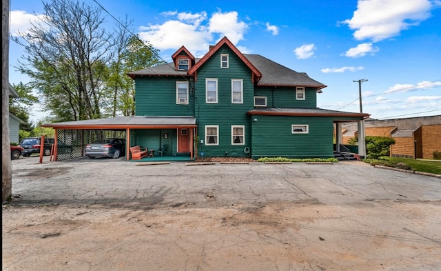 view of property featuring a carport