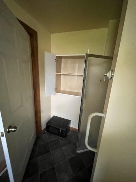 bathroom with a stall shower