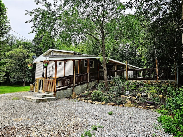 view of front of house with a deck