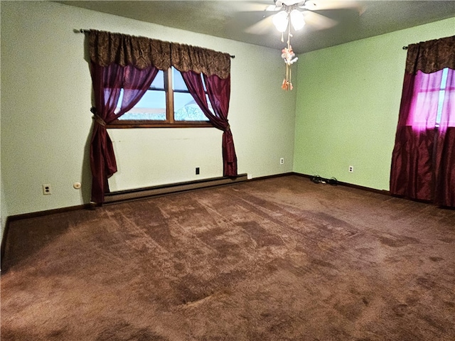 carpeted spare room featuring a baseboard radiator and ceiling fan