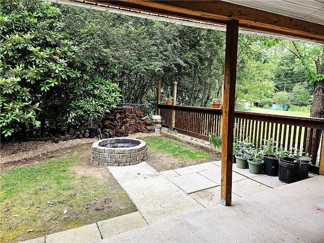 exterior space with an outdoor fire pit