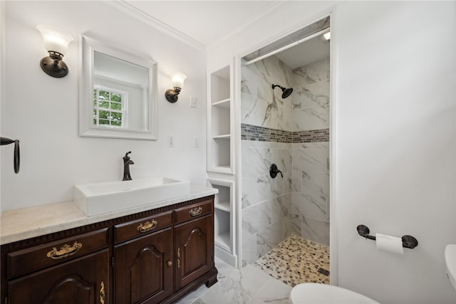 bathroom with a tile shower, oversized vanity, toilet, and tile floors