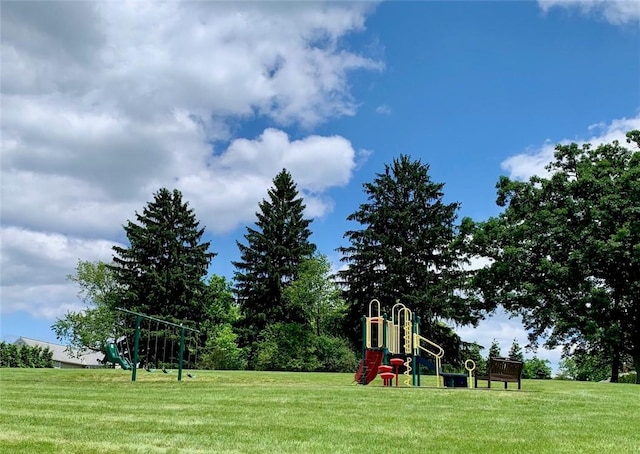 view of playground with a yard