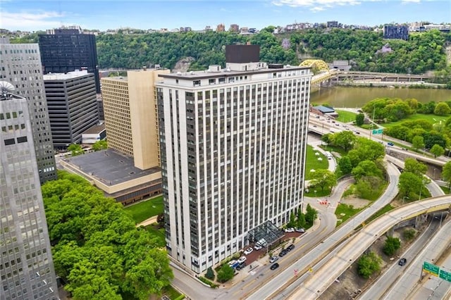 birds eye view of property featuring a water view