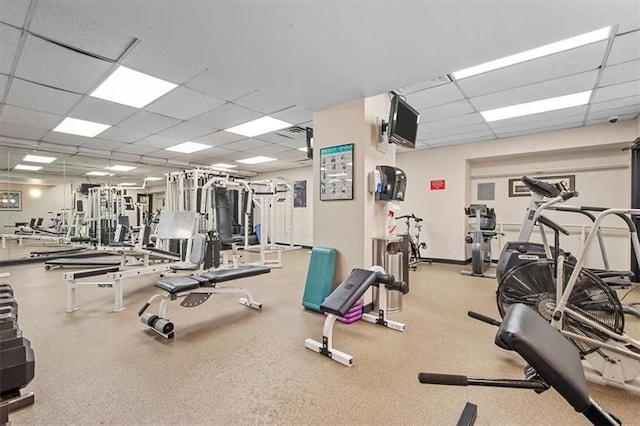 workout area with a drop ceiling