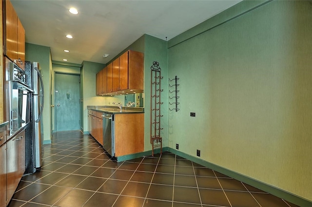 kitchen featuring sink and appliances with stainless steel finishes