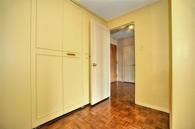 hallway with dark parquet floors