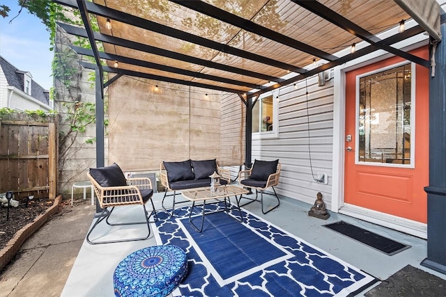 view of patio / terrace featuring a pergola and outdoor lounge area