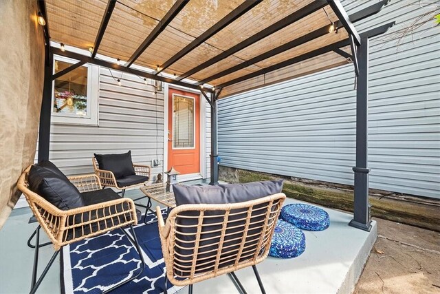 view of patio featuring a pergola