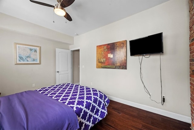 bedroom with wood-type flooring and ceiling fan