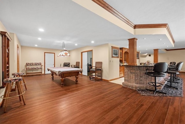 playroom with indoor bar, light hardwood / wood-style floors, ornamental molding, and pool table