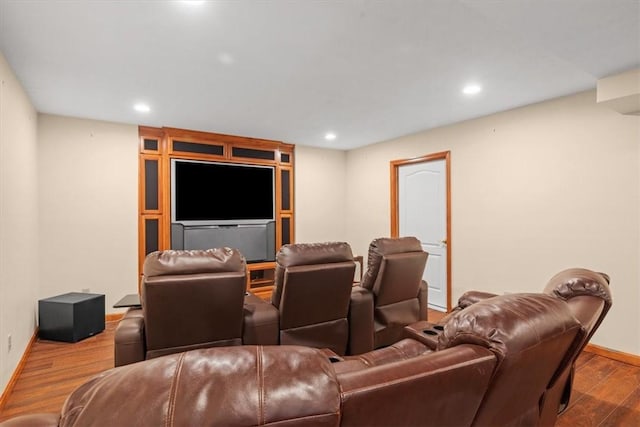 home theater featuring hardwood / wood-style floors