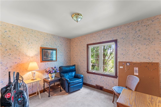 living area with carpet flooring