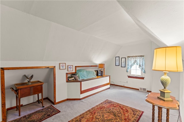 living area with vaulted ceiling and light carpet