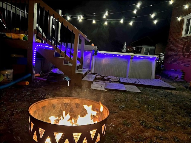 exterior space with a fire pit