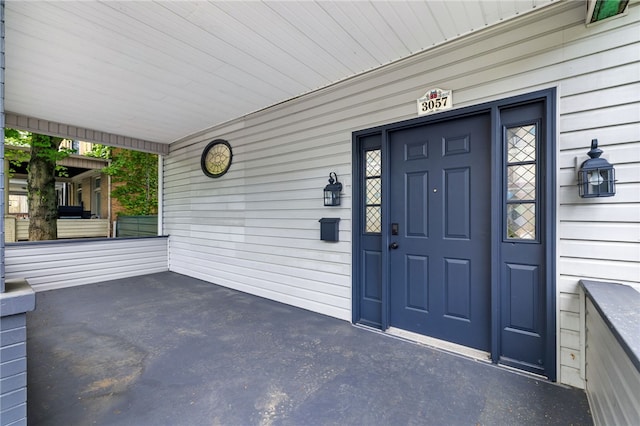 property entrance with a porch