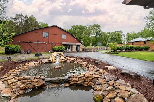 exterior space featuring a front lawn