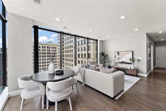 350 Oliver Ave Unit 1102, Downtown Pgh, PA 15222 - living area with wood finished floors, recessed lighting, baseboards, and expansive windows
