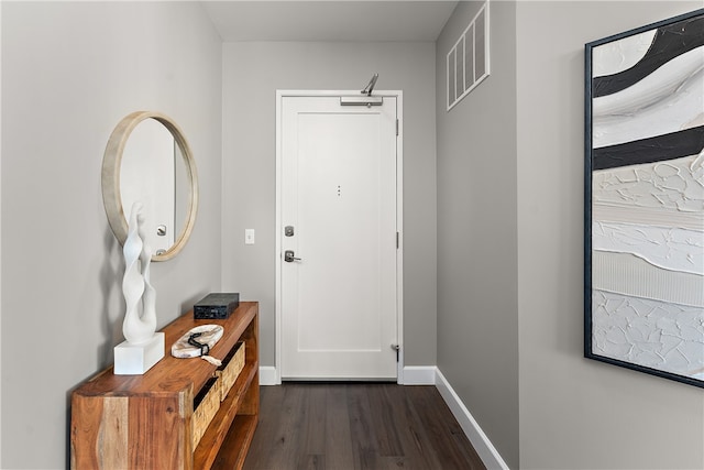 doorway with dark hardwood / wood-style floors