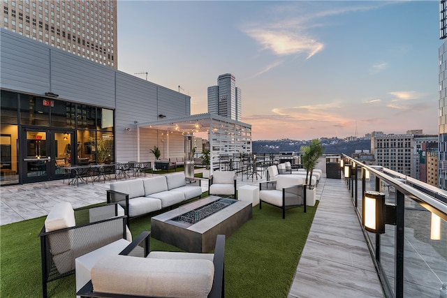 patio terrace at dusk with outdoor lounge area