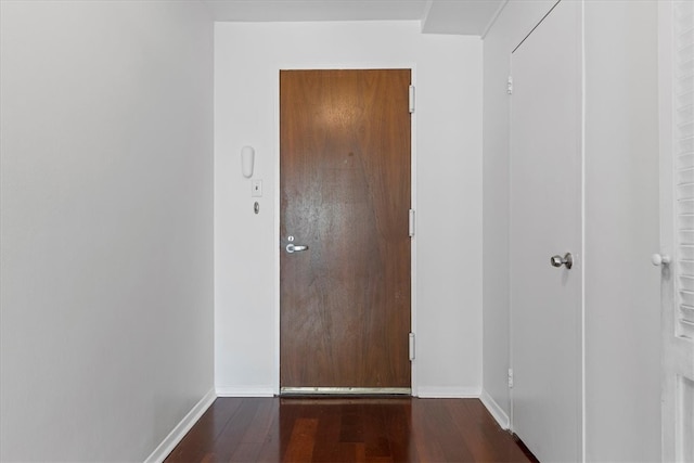 hallway featuring wood-type flooring