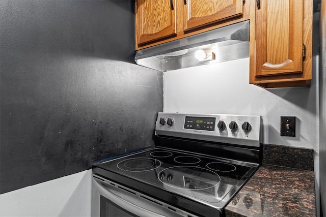 kitchen with stainless steel range with electric stovetop