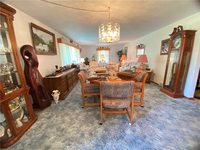 carpeted dining area featuring an inviting chandelier