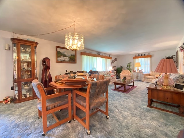 carpeted dining room featuring a chandelier