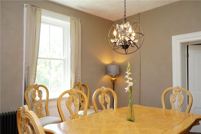 dining room featuring a chandelier and a wealth of natural light