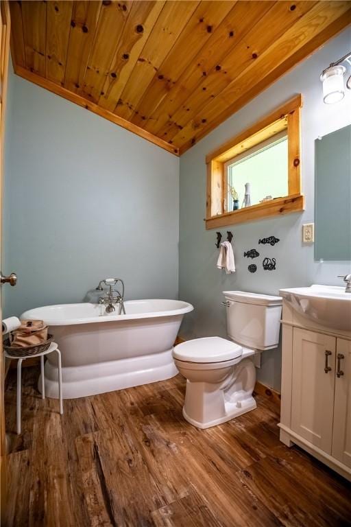 470 Truitt Rd, Pa, PA 16374 - bathroom featuring a soaking tub, vanity, wood finished floors, toilet, and wooden ceiling