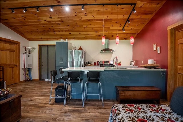 470 Truitt Rd, Pa, PA 16374 - kitchen featuring rail lighting, appliances with stainless steel finishes, wall chimney range hood, dark wood-style flooring, and wooden ceiling