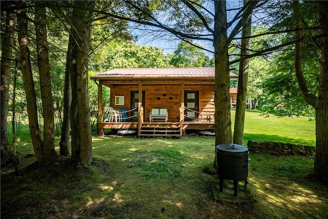 470 Truitt Rd, Pa, PA 16374 - view of front of home featuring a front lawn and metal roof