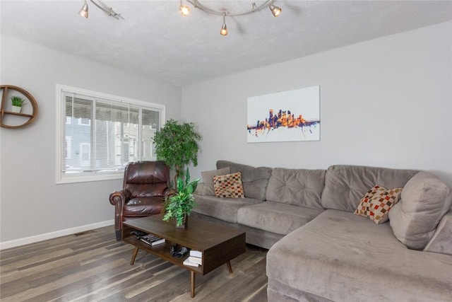 living room with dark wood-type flooring