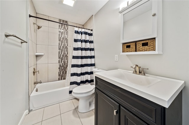 full bathroom featuring tile patterned floors, vanity, toilet, and shower / tub combo