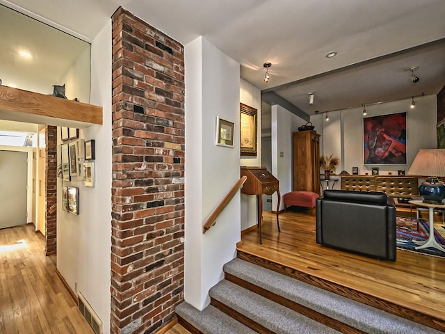 interior space with visible vents and hardwood / wood-style floors