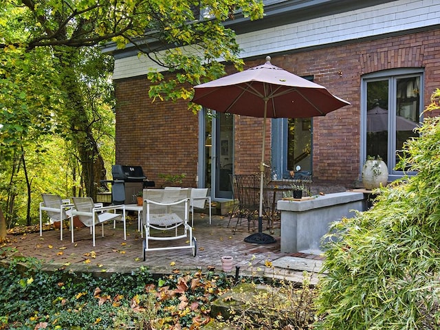 view of patio / terrace with outdoor dining area and area for grilling