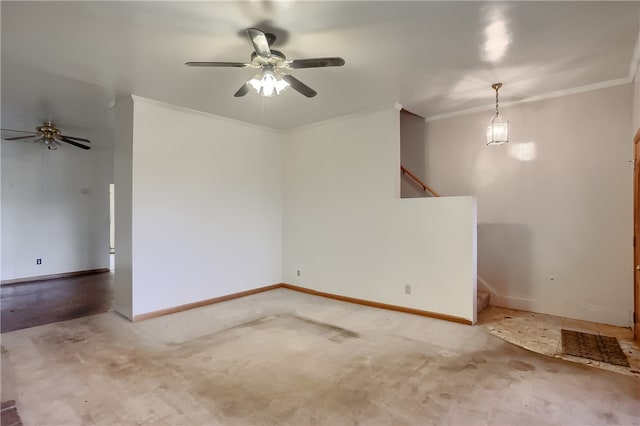 carpeted empty room featuring crown molding and ceiling fan