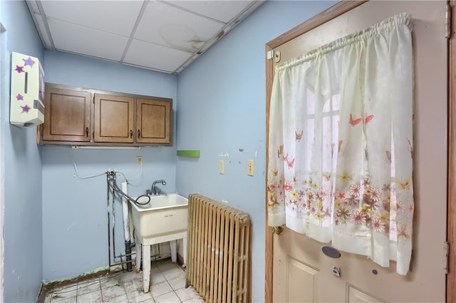 laundry room featuring radiator and hookup for a washing machine