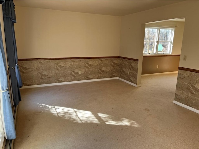 empty room featuring carpet floors