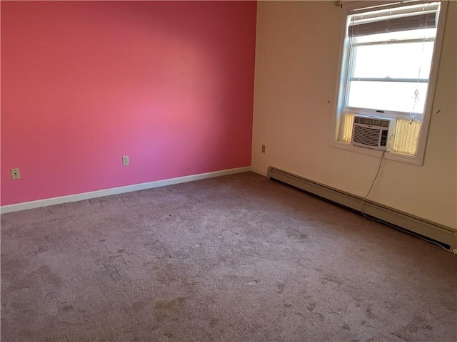 carpeted empty room featuring cooling unit and a baseboard radiator