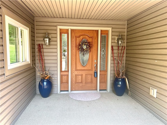 doorway to property with a porch