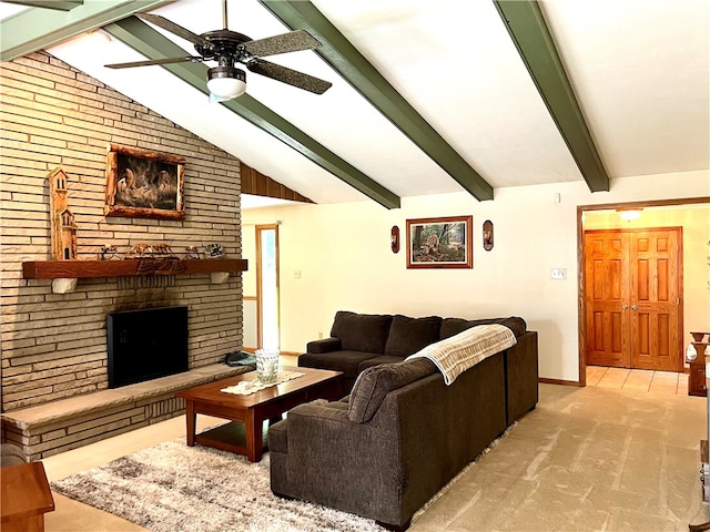 living room with light carpet, vaulted ceiling with beams, a fireplace, and ceiling fan