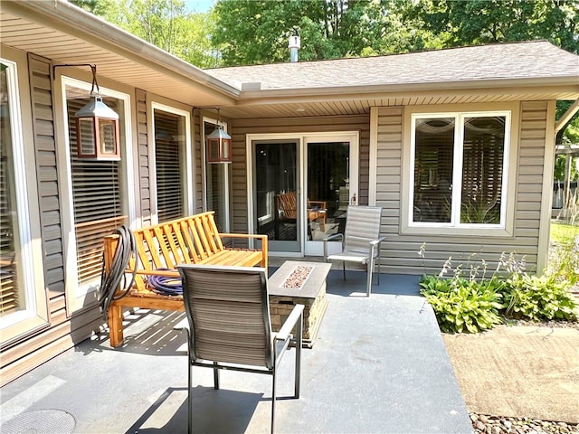 view of patio with a fire pit