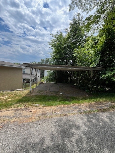 613 Center St, Versailles Boro, PA 15132 - view of vehicle parking with a carport