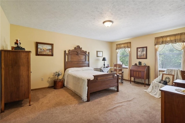 carpeted bedroom featuring a textured ceiling